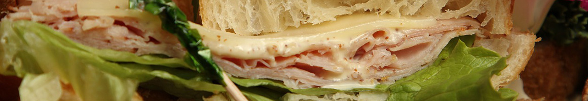 Eating Deli Sandwich at Aviation Deli & Grill restaurant in Glen Burnie, MD.